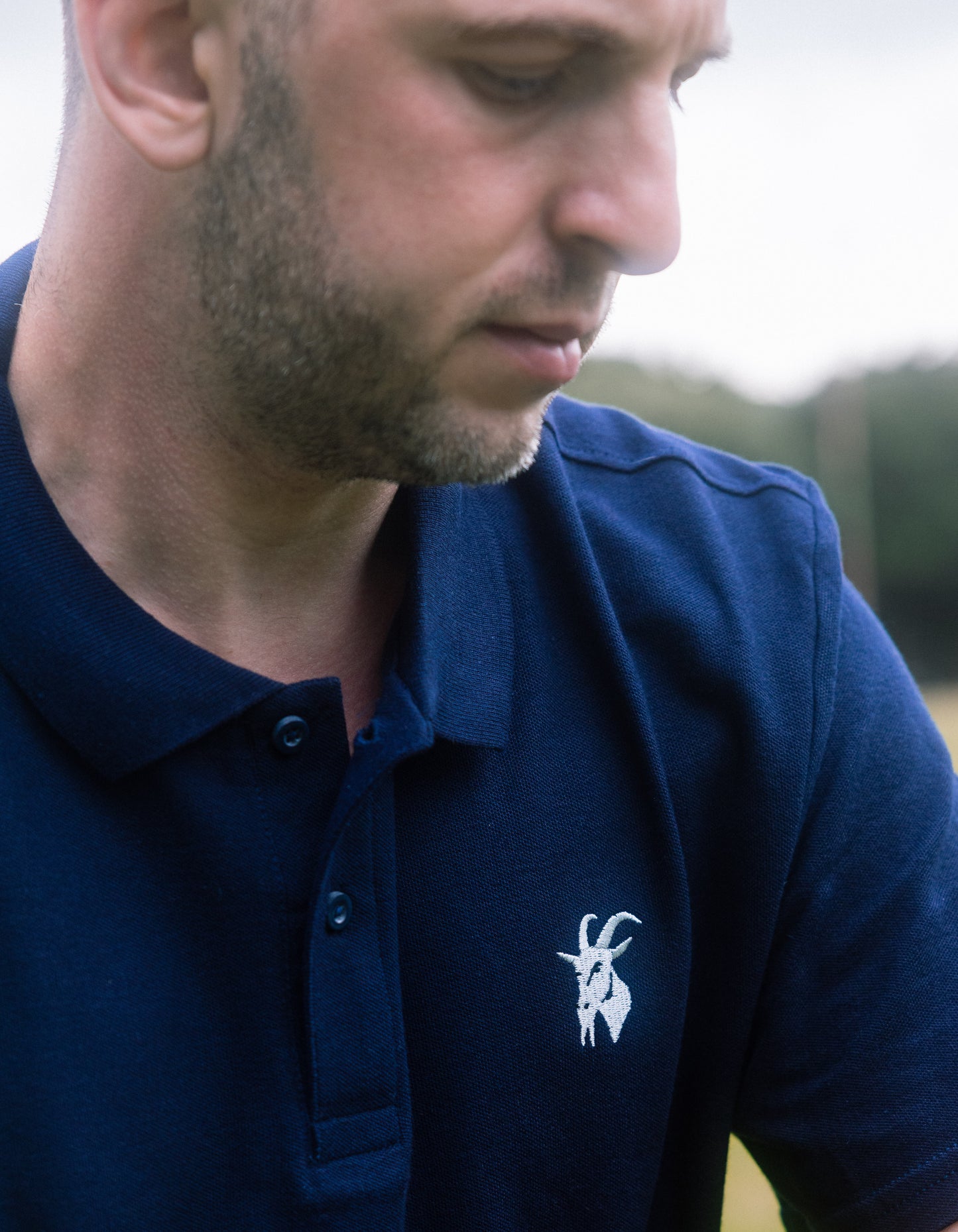 Polo Gwreiddiol Brodiog Glas Tywyll